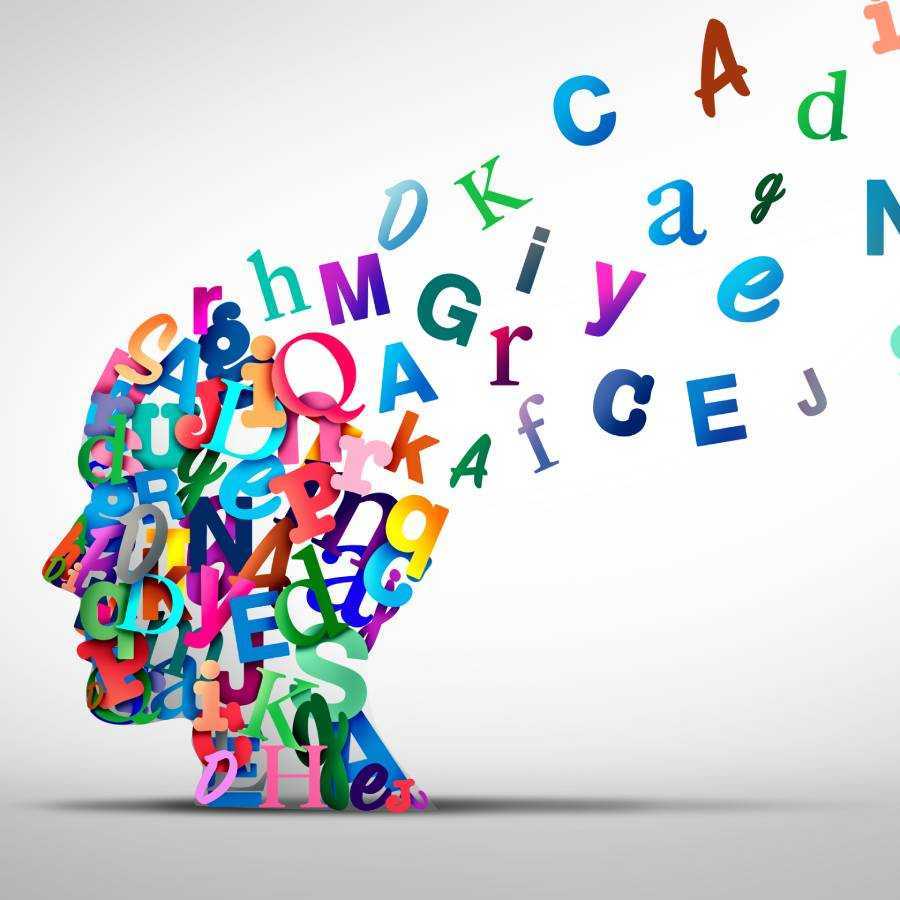 A person 's head made up of letters.